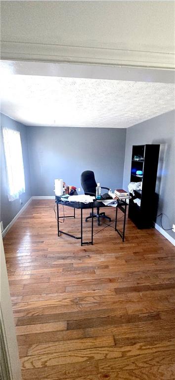 4034 Weeks Drive Kennesaw, GA 30144 - Photo 23 of 24 a living room with furniture and a flat screen tv