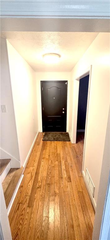 4034 Weeks Drive Kennesaw, GA 30144 - Photo 10 of 24 a view of hallway with wooden floor