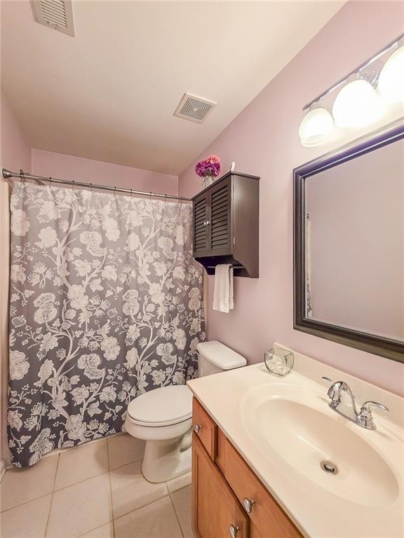 43 Ivy Mist Lane Acworth, GA 30101 - Photo 24 of 58 a bathroom with a sink toilet and mirror