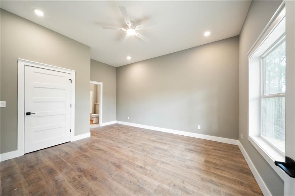 2956 Blalock Mountain Road Talking Rock, GA 30175 - Photo 33 of 65 an empty room with windows and closet
