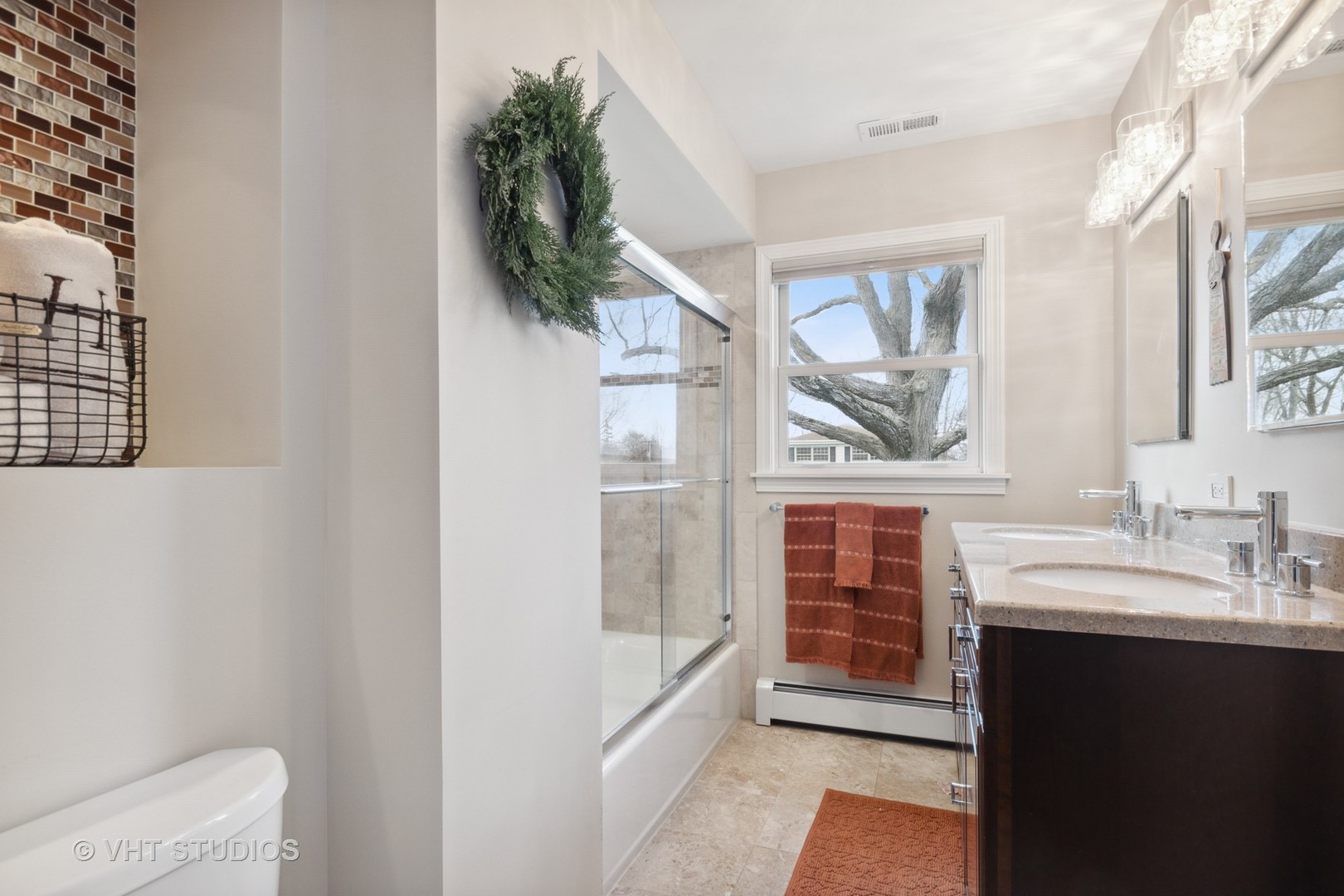 271 Beverly Road Barrington, IL 60010 - Photo 12 of 18 a bathroom with a sink a toilet and a window