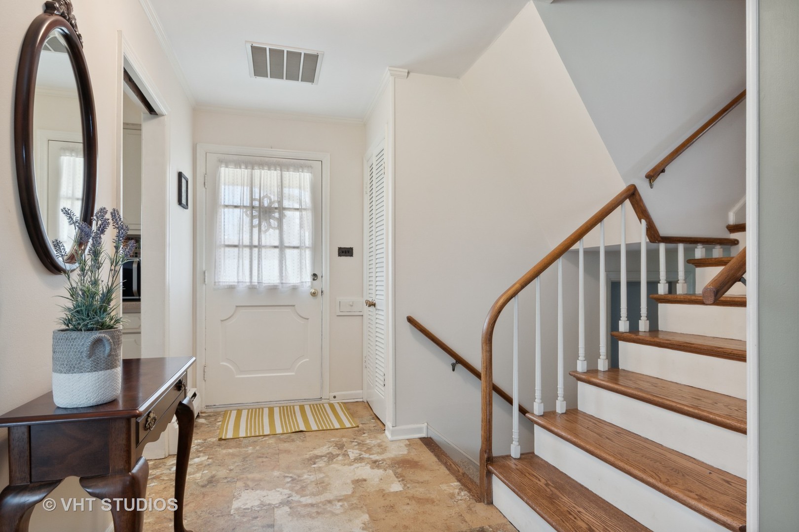 271 Beverly Road Barrington, IL 60010 - Photo 2 of 18 a view of an entryway with wooden floor and a livingroom view