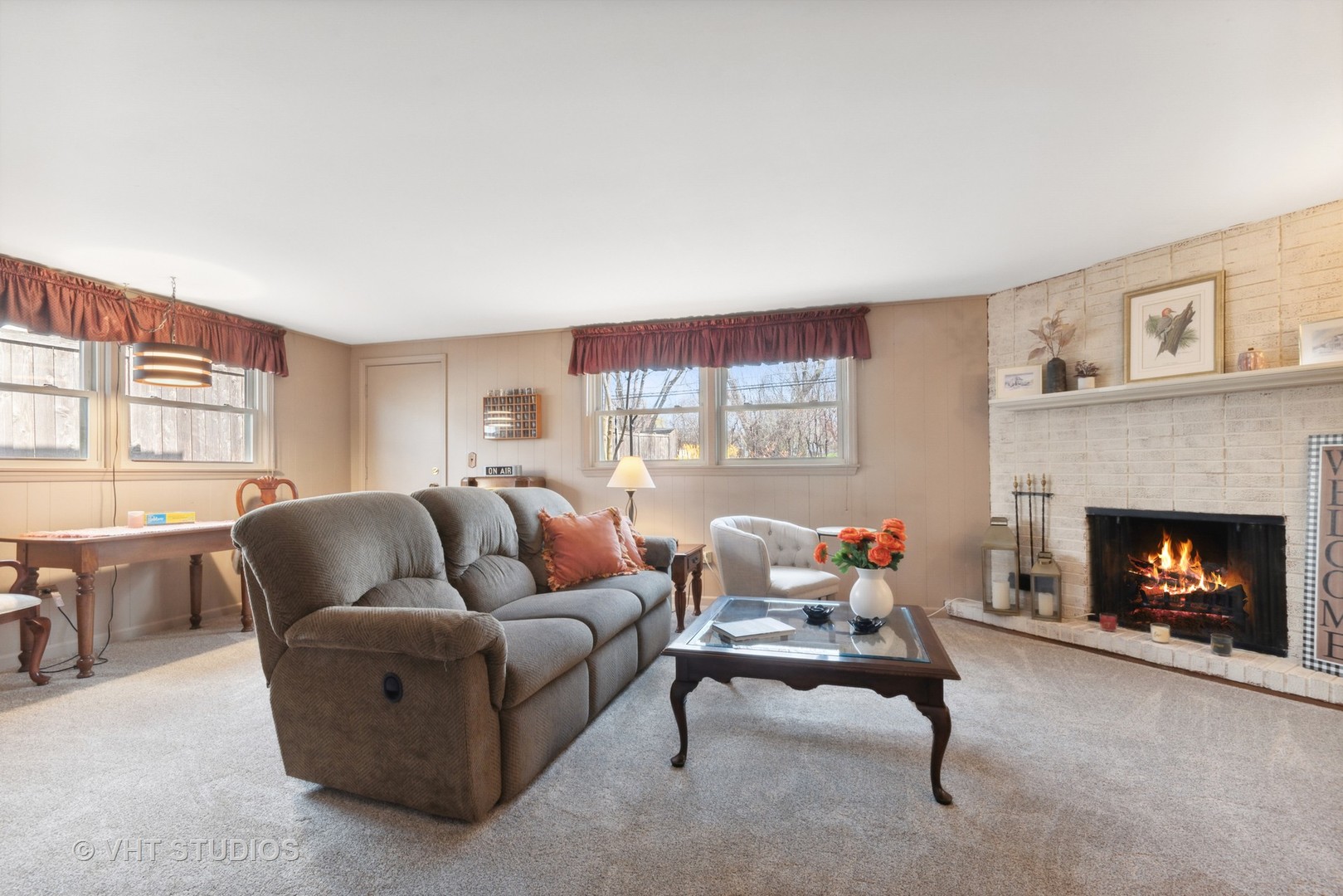 271 Beverly Road Barrington, IL 60010 - Photo 7 of 18 a living room with furniture and a fireplace