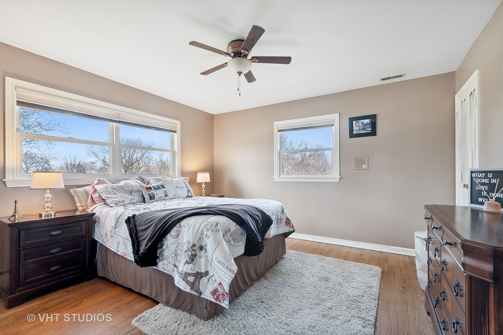 271 Beverly Road Barrington, IL 60010 - Photo 9 of 18 a bedroom with a bed and wooden floor