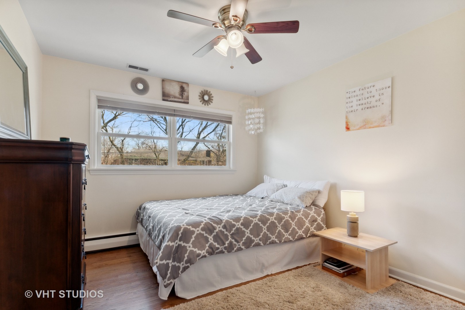 271 Beverly Road Barrington, IL 60010 - Photo 10 of 18 a bedroom with a bed and a painting on the wall