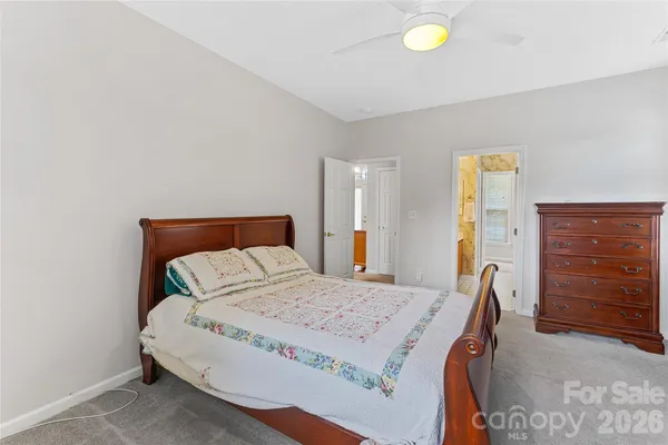 a bedroom with a bed and furniture