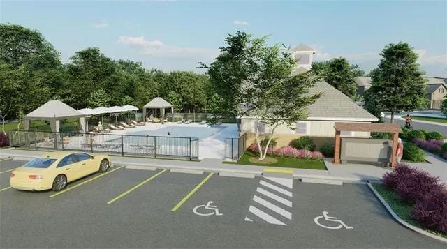 an aerial view of a house yard swimming pool and outdoor seating