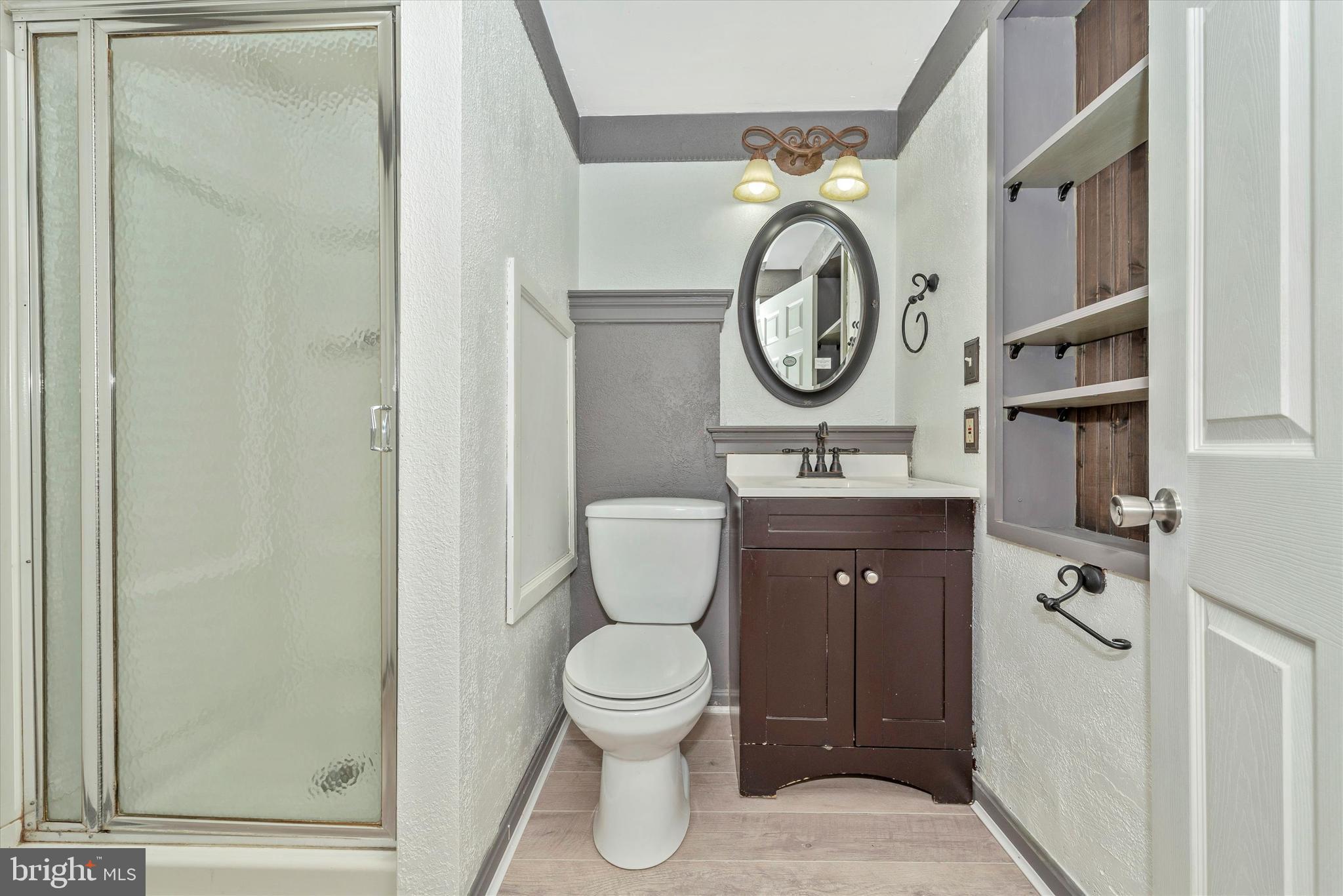 624 Beaver Creek Road Hagerstown, MD 21740 - Photo 29 of 42 Hall bath blends new fixtures with classic shelves