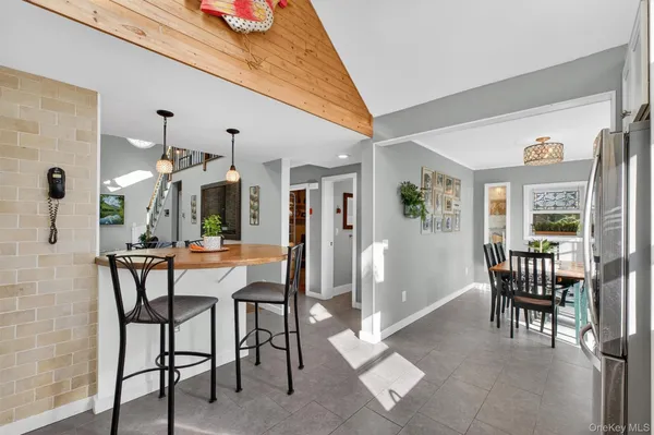 a view of a livingroom with furniture and window
