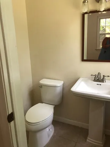 a bathroom with a sink and a toilet