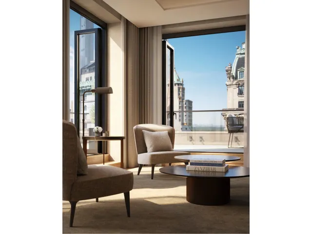 a view of a patio with couches chairs potted plants and floor to ceiling window