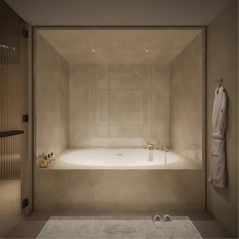 a bathroom with a bathtub and shower