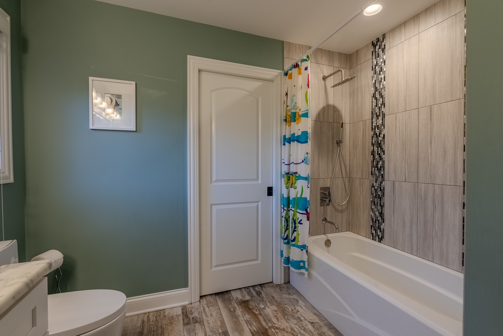 863 Bittersweet Drive Northbrook, IL 60062 - Photo 32 of 51 a bathroom with a toilet and a bathtub