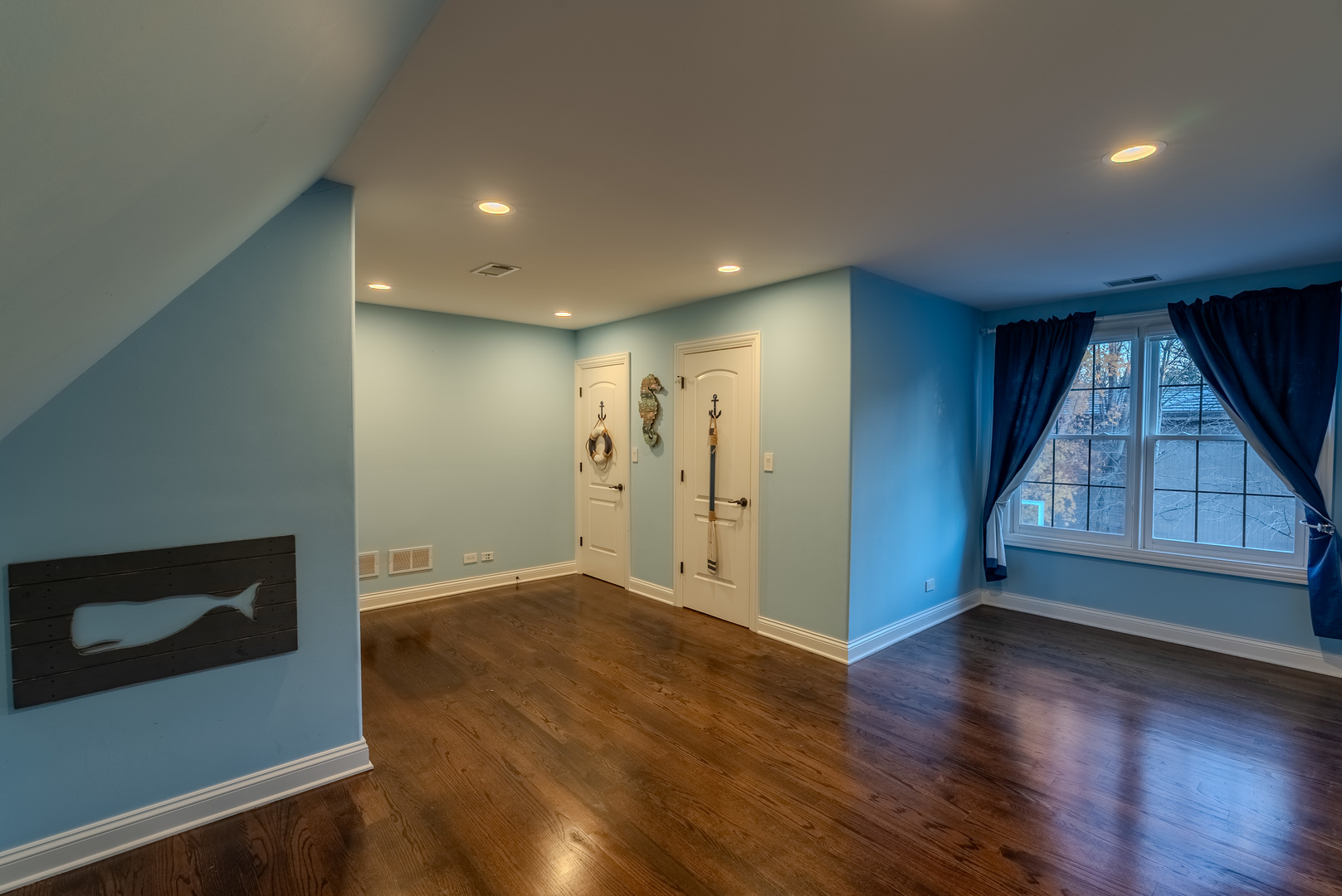 863 Bittersweet Drive Northbrook, IL 60062 - Photo 34 of 51 an empty room with wooden floor and windows