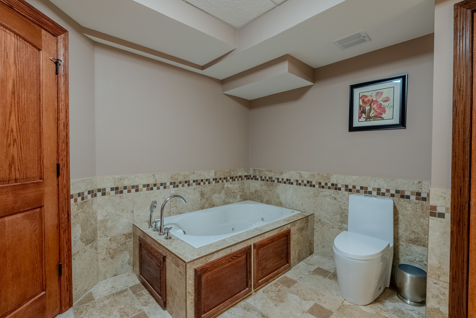 863 Bittersweet Drive Northbrook, IL 60062 - Photo 45 of 51 a bathroom with a granite countertop sink a toilet a shower and a mirror