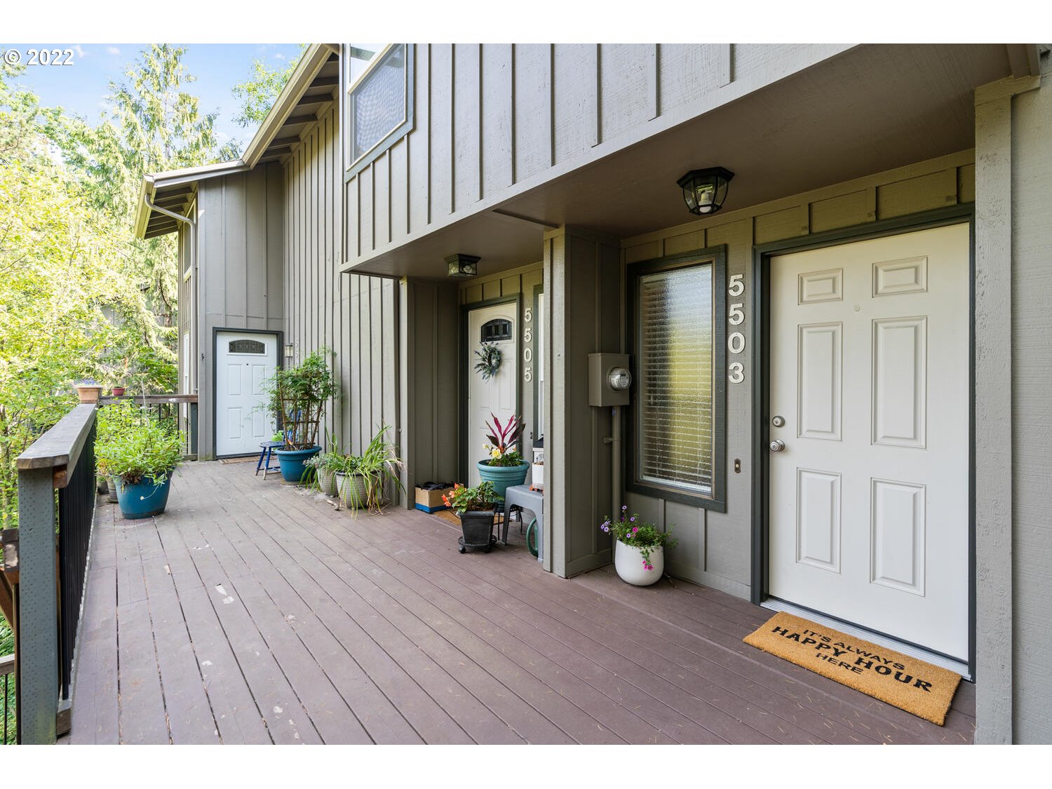 5503 Southwest Multnomah Boulevard Portland, OR 97219 - Photo 1 of 21 a view of a house with wooden floor