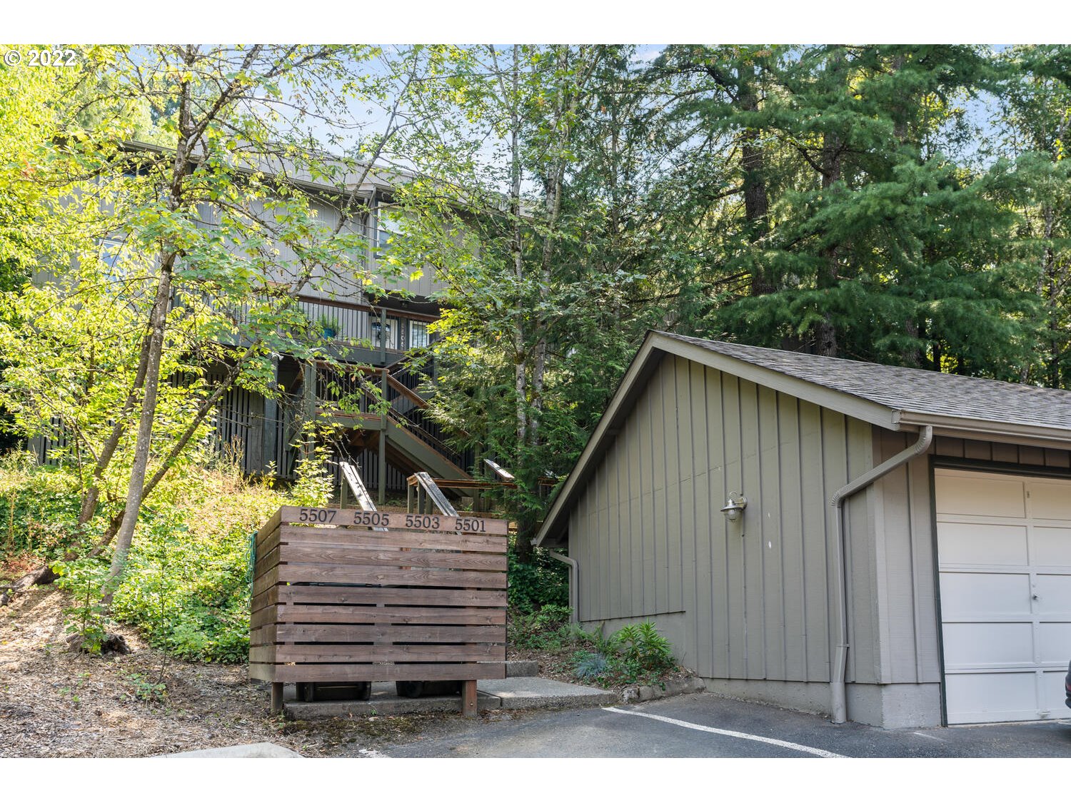5503 Southwest Multnomah Boulevard Portland, OR 97219 - Photo 21 of 21 a view of house with a outdoor space