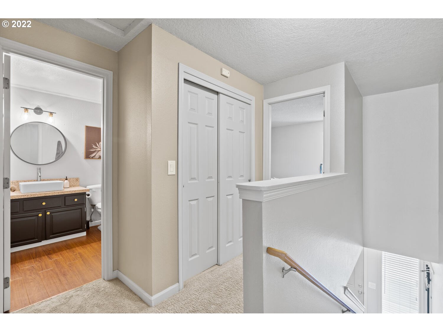 5503 Southwest Multnomah Boulevard Portland, OR 97219 - Photo 9 of 21 a bathroom with a sink and a mirror