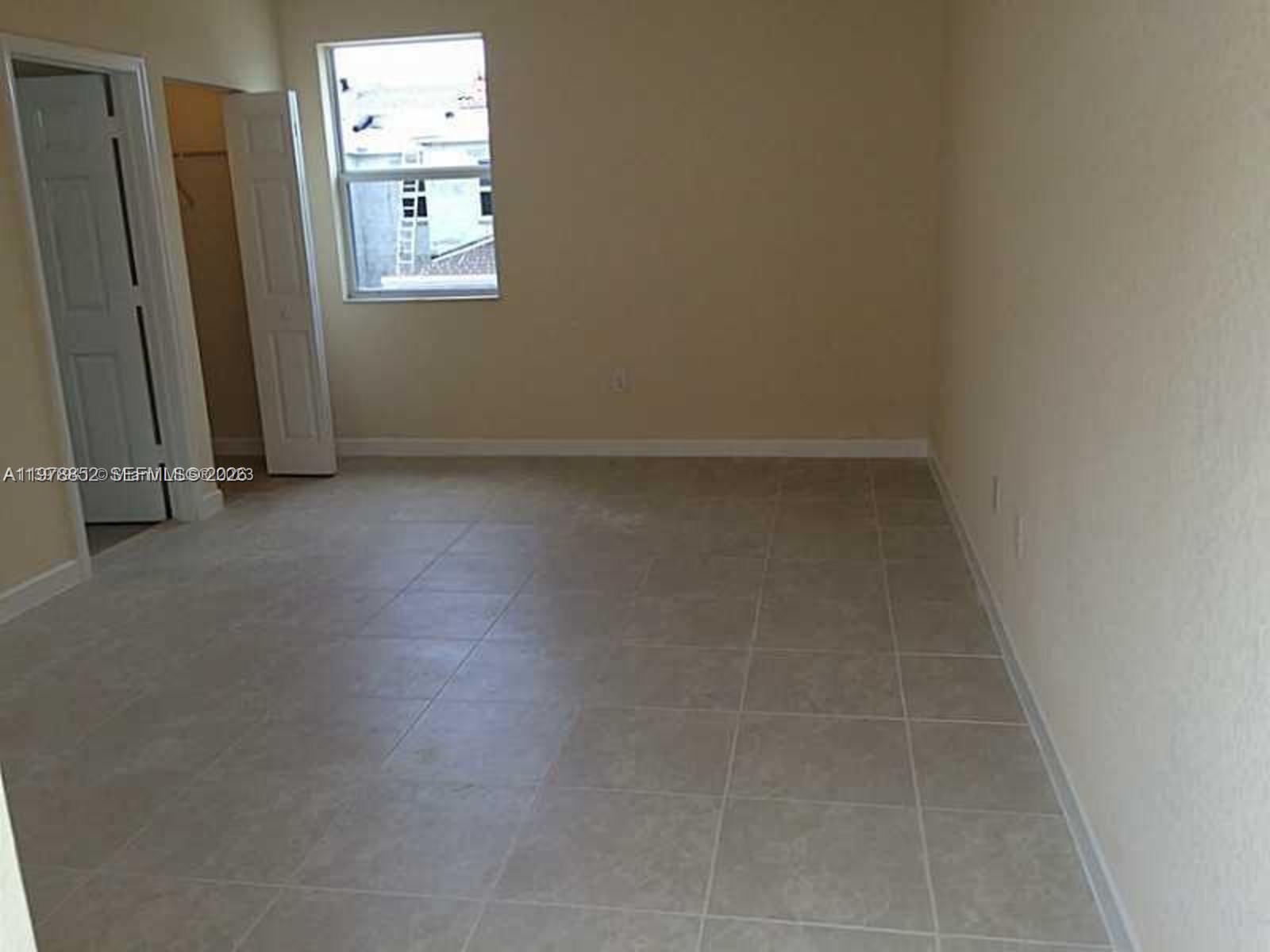 17120 Southwest 95th Terrace, Unit STUDIO Miami, FL 33196 - Photo 4 of 10 a view of a small space