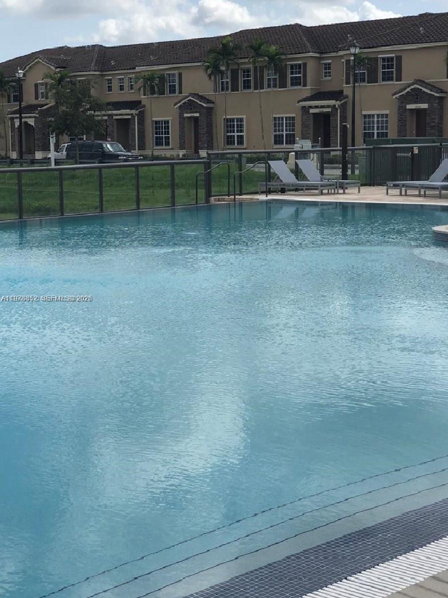 17120 Southwest 95th Terrace, Unit STUDIO Miami, FL 33196 - Photo 10 of 10 a view of a house with backyard