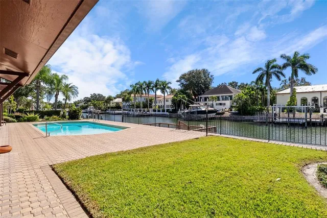 a room with lot of cabinets and window