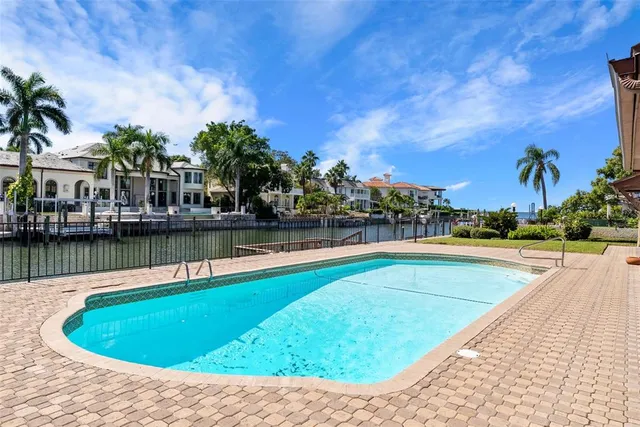 a bedroom with two beds and a window