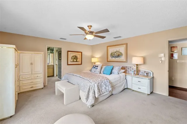 a front view of house with yard and trees