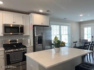16 Elder Street, Unit 78 Mantoloking, NJ 08738 - Photo 1 of 26 a kitchen with stainless steel appliances a microwave sink and refrigerator