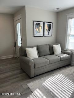 16 Elder Street, Unit 78 Mantoloking, NJ 08738 - Photo 12 of 26 a living room with furniture and a window
