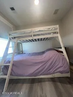 a bathroom with a toilet sink and shower