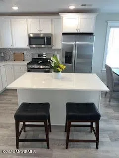 a view of a kitchen and a kitchen