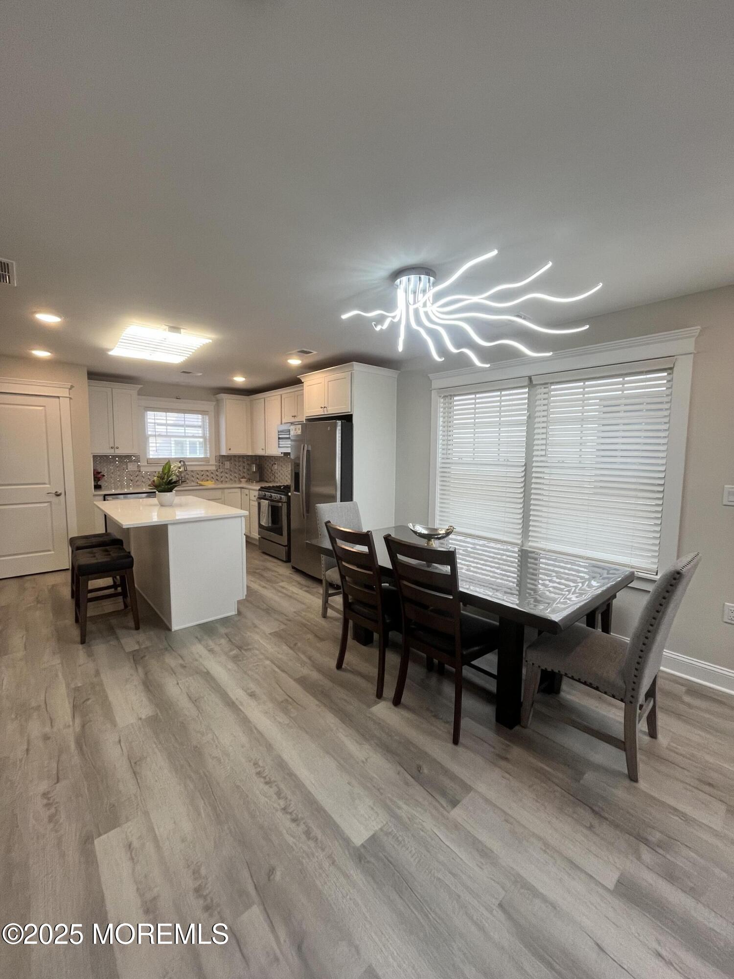 16 Elder Street, Unit 78 Mantoloking, NJ 08738 - Photo 7 of 26 a view of a kitchen and a kitchen