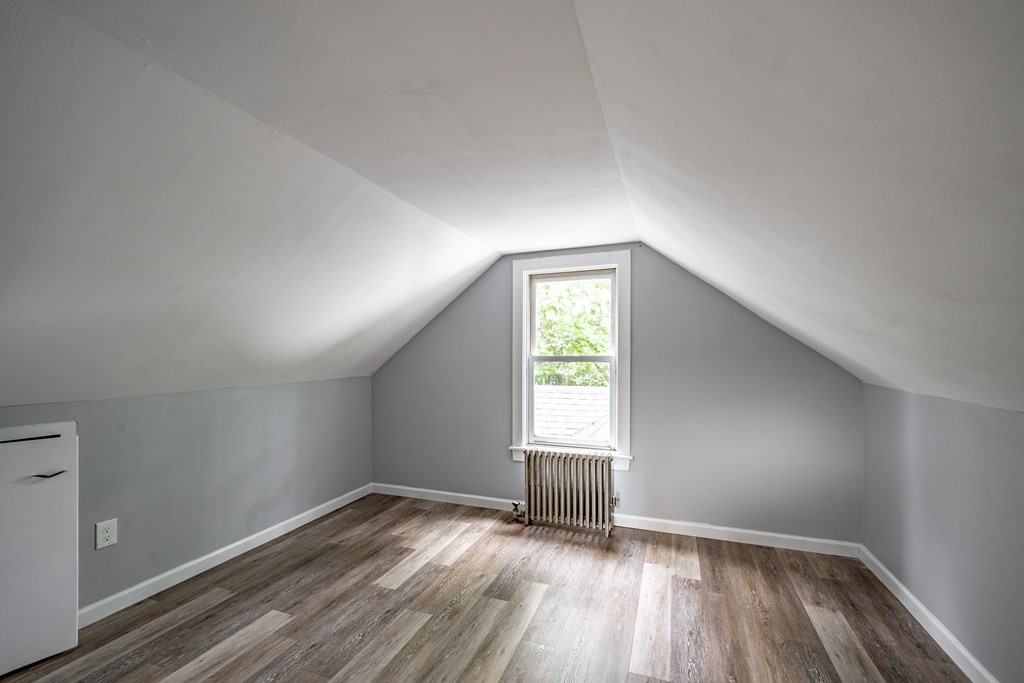 21 Wilbraham Road Monson, MA 01057 - Photo 15 of 26 an empty room with wooden floor and windows