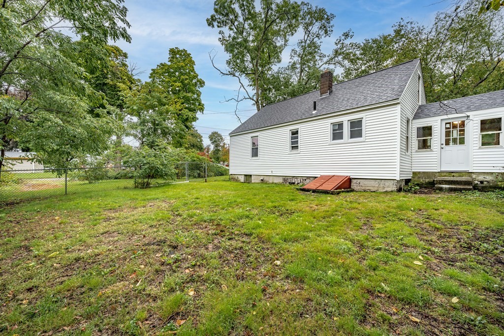 21 Wilbraham Road Monson, MA 01057 - Photo 25 of 26 a backyard of a house with lots of green space