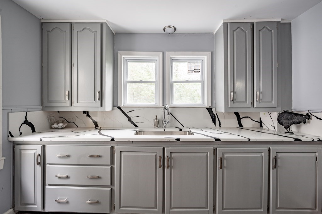 21 Wilbraham Road Monson, MA 01057 - Photo 5 of 26 a view of cabinets with sink