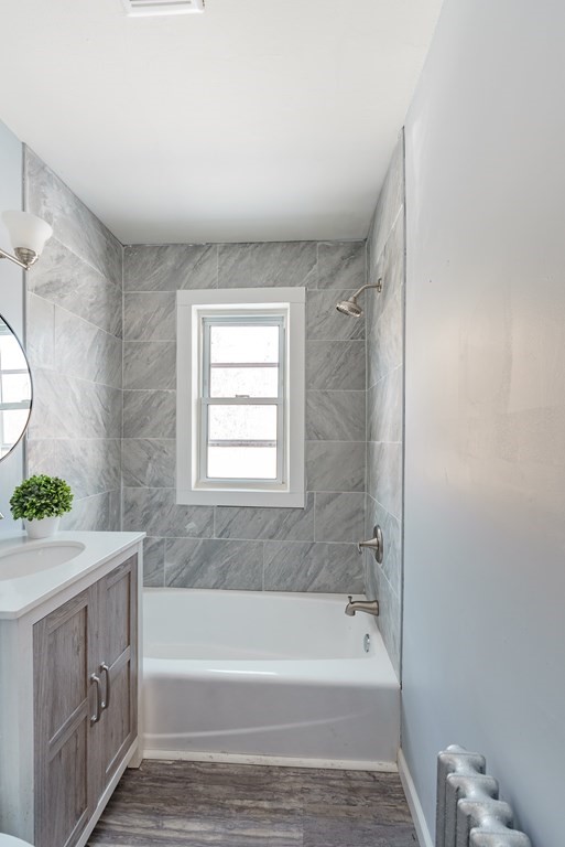 21 Wilbraham Road Monson, MA 01057 - Photo 10 of 26 a bathroom with a granite countertop bathtub sink vanity and toilet