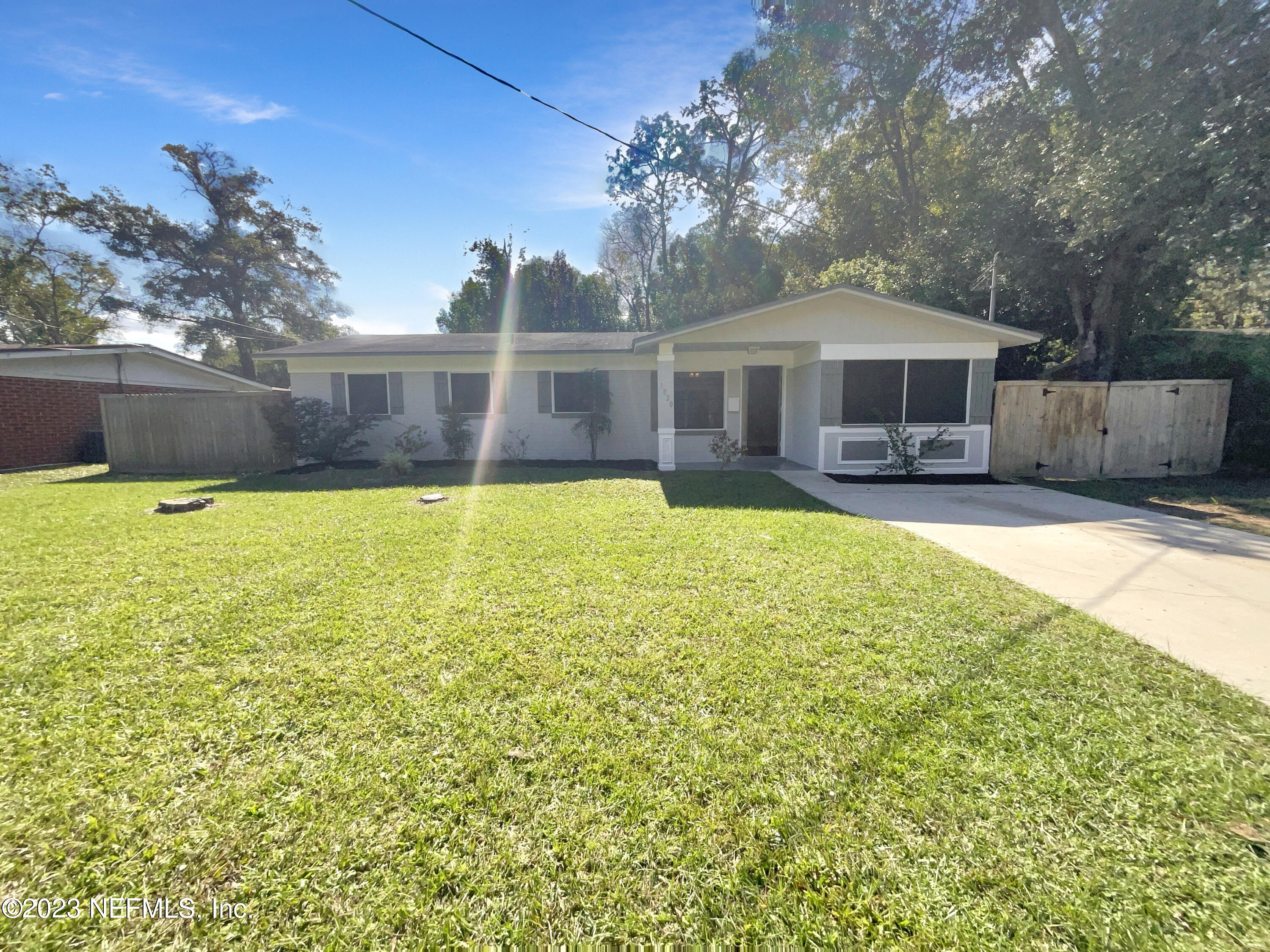 1820 Leonid Road Jacksonville, FL 32218 - Photo 1 of 21 a view of a house with swimming pool and sitting area
