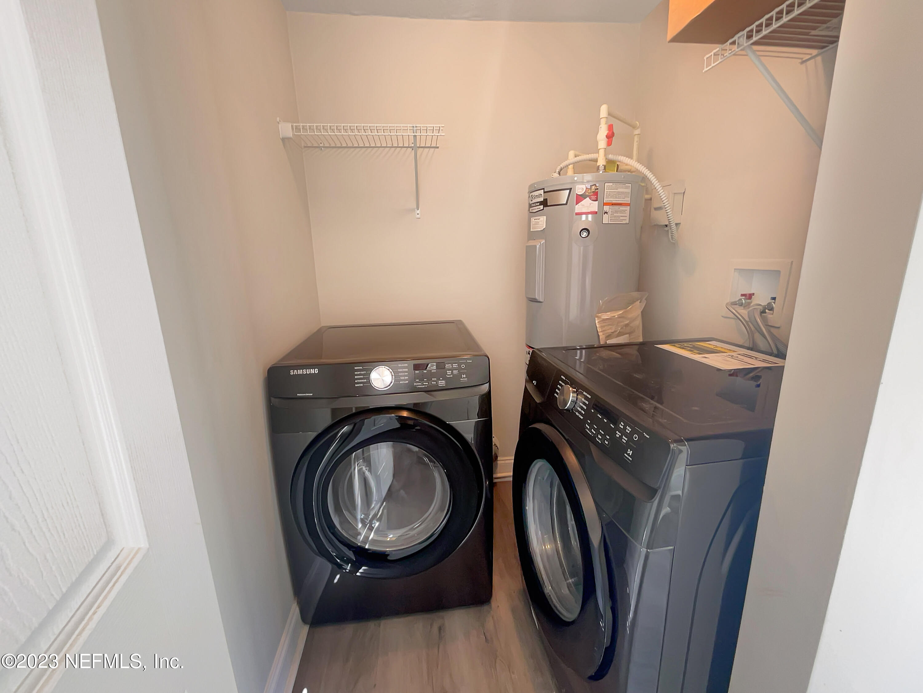 1820 Leonid Road Jacksonville, FL 32218 - Photo 18 of 21 a utility room with dryer and washer