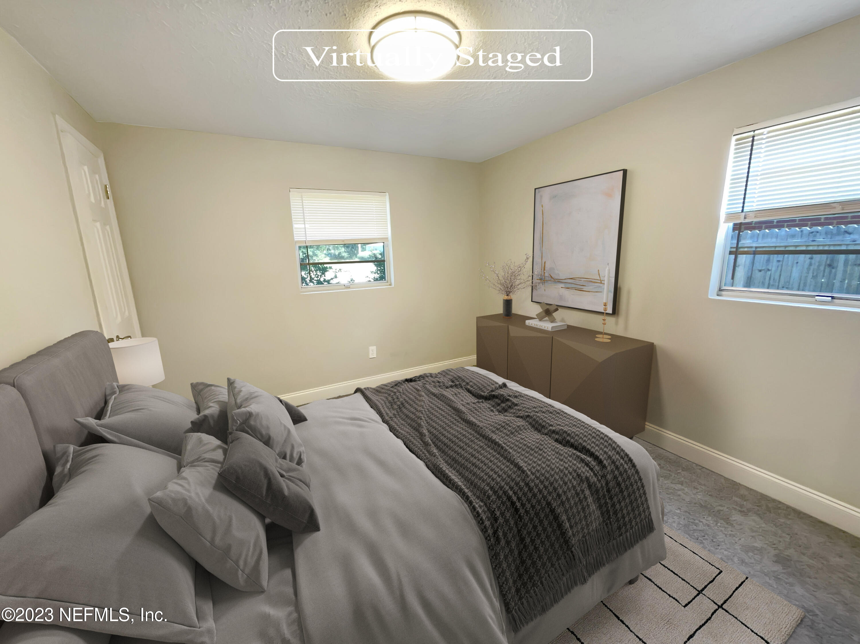 1820 Leonid Road Jacksonville, FL 32218 - Photo 4 of 21 a bedroom with bed and window