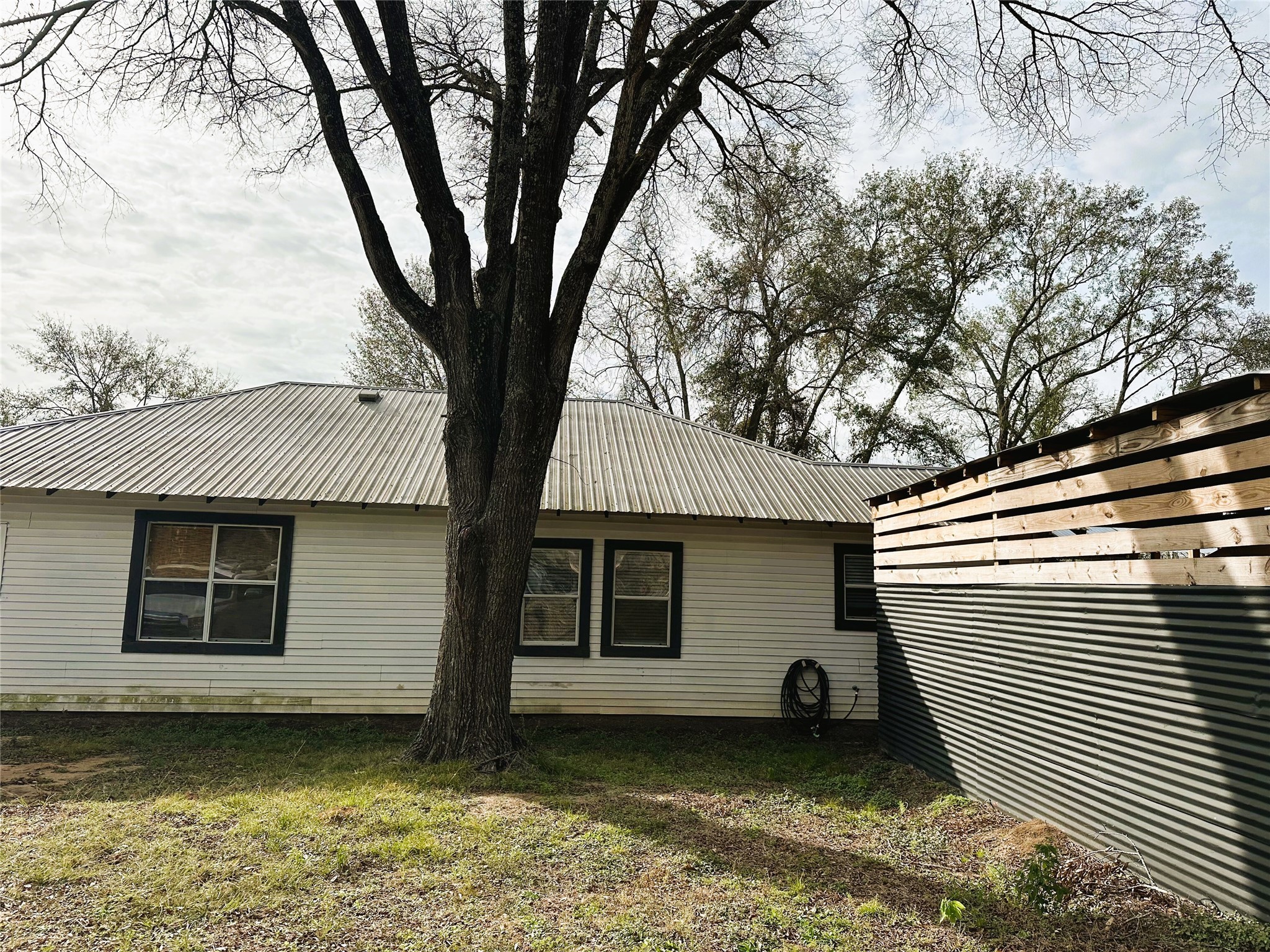 0 South Fm 1486 Road Montgomery, TX 77316 - Photo 29 of 33 Carport and side of house