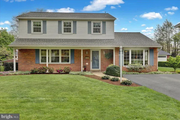 a house view with a garden space
