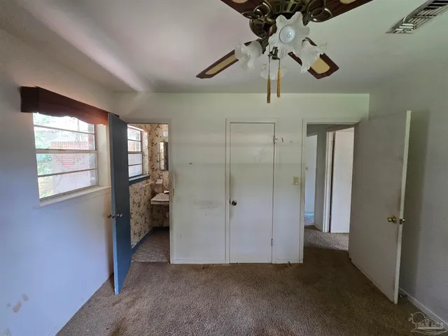 a bathroom with a toilet and a sink