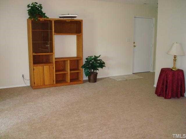 5016 Flint Ridge Place Raleigh, NC 27609 - Photo 12 of 12 a view of a room with wooden wall and closet