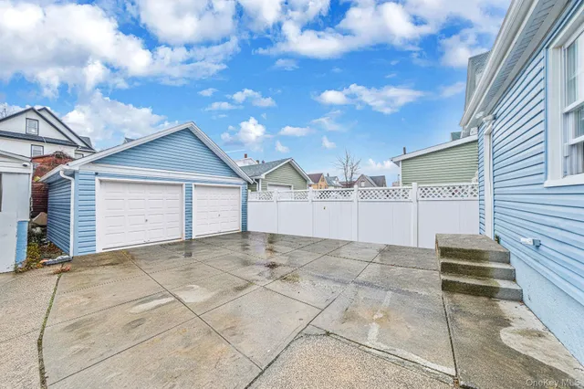 a view of a house with a garage