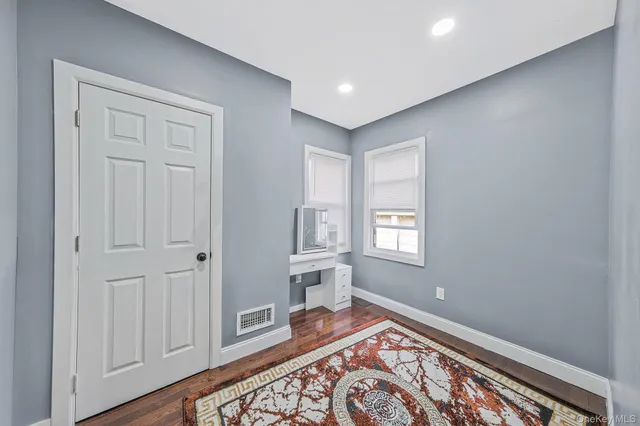 a view of an empty room and window