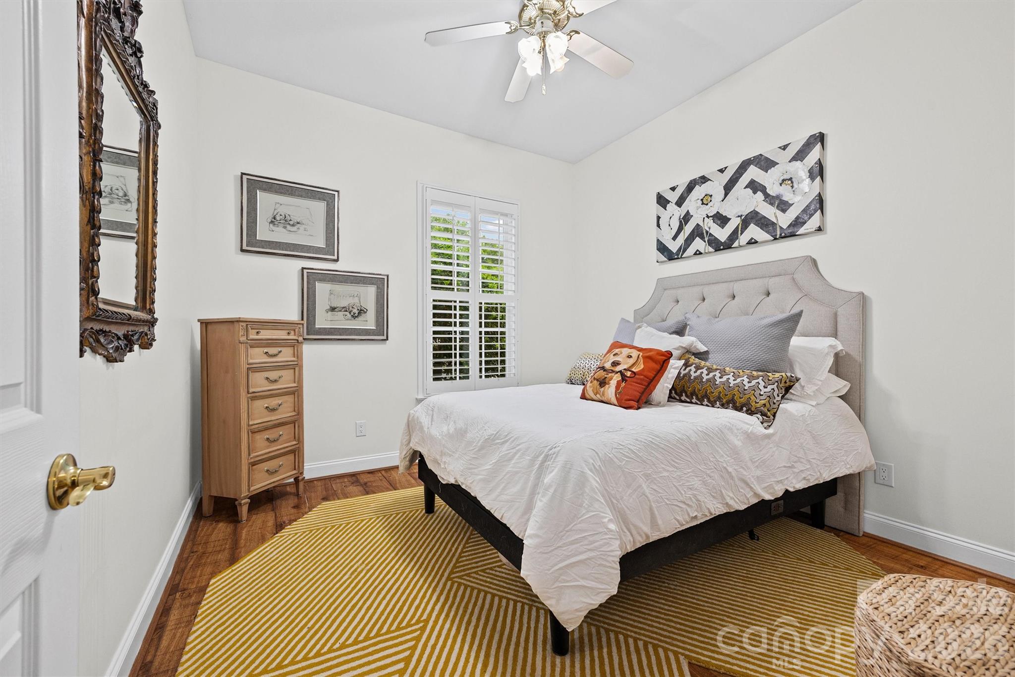 2578 Lower Assembly Drive Fort Mill, SC 29708 - Photo 18 of 28 a bedroom with a bed and a table in it