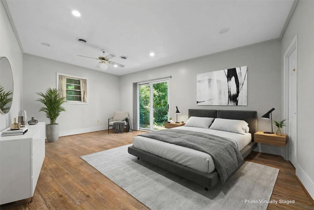 103 Satula Lane Clemson, SC 29631 - Photo 39 of 50 This airy bedroom features abundant natural light and seamless outdoor access.