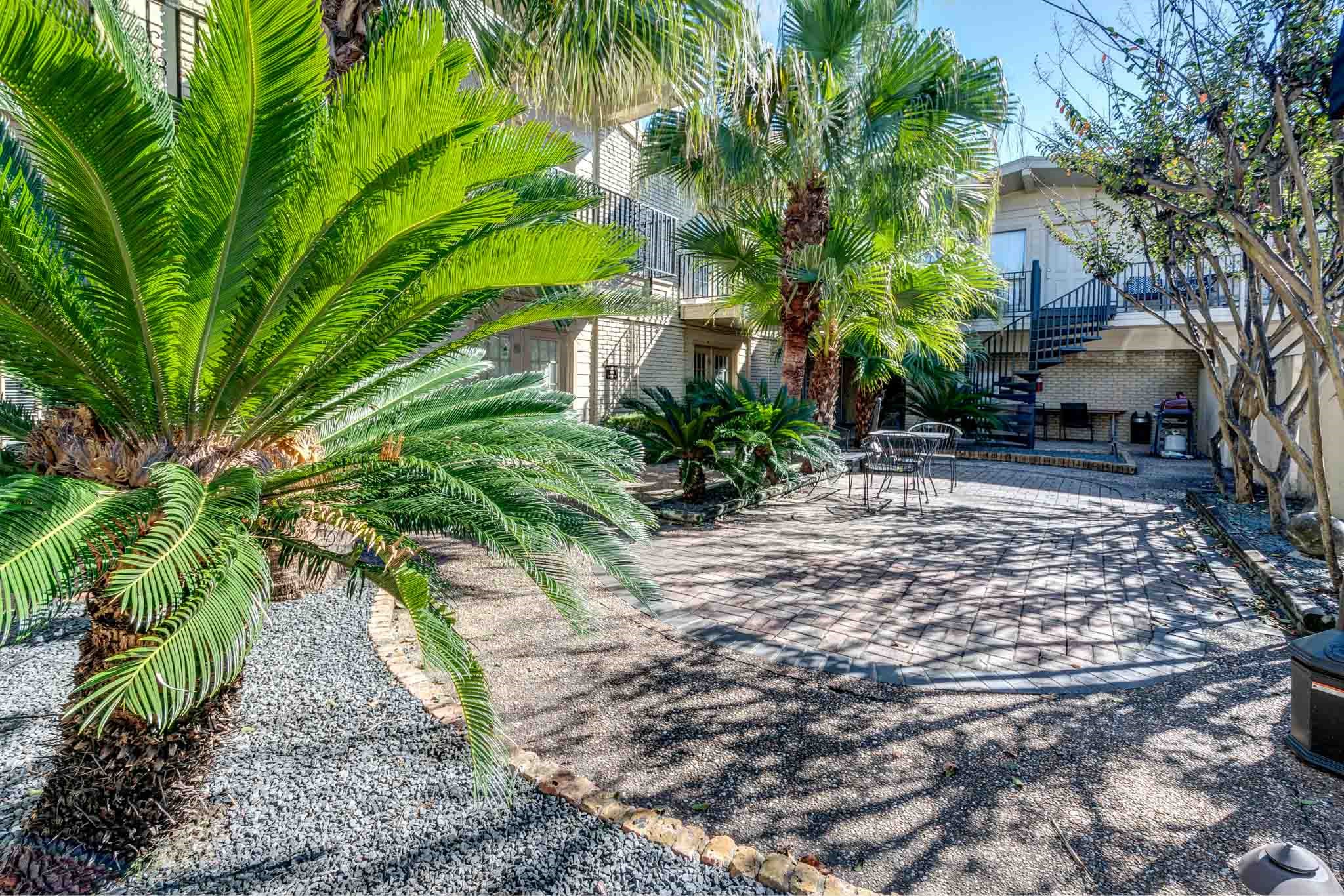 4321 Hazard Street, Unit 9 Houston, TX 77098 - Photo 9 of 11 a pathway of a yard