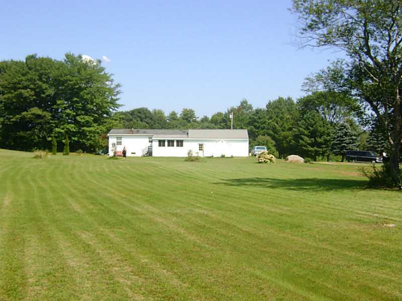 154 Mountain Road Arundel, ME 04046 - Photo 9 of 35 Exterior Back. Looking from back of...