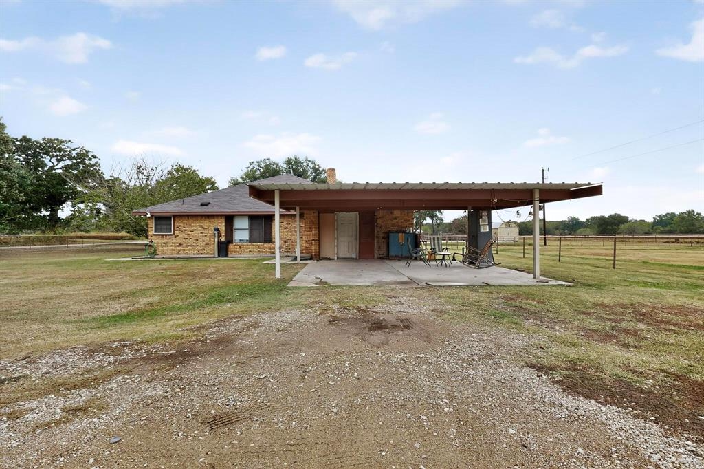 865 Harlan Road Combine, TX 75159 - Photo 32 of 38 a front view of a house with garden